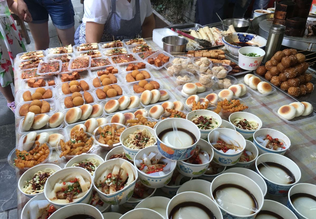 Recipes that travel across borders while keeping families, markets, and memory linked by flavor